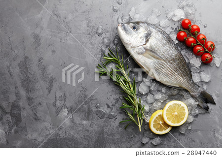 Fresh gilthead bream or dorado cooking 28947440