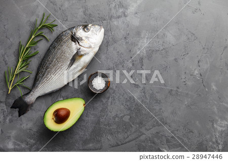 Fresh gilthead bream or dorado cooking Fresh gilthead bream or dorado cooking 28947446