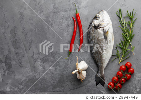 Fresh gilthead bream or dorado cooking 28947449