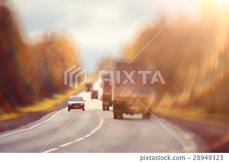 background blur road autumn sunbeams glare background blur road autumn sunbeams glare 28949323
