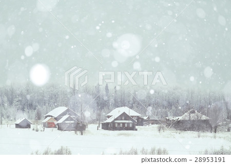 rural landscape with small houses on a snowy day 28953191