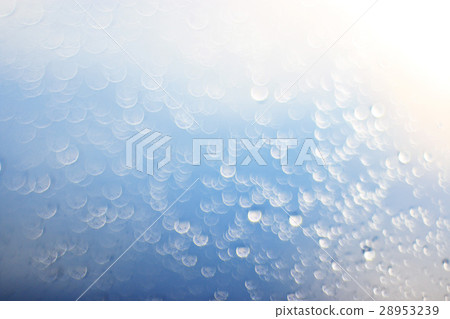 light blue background bokeh drops glass, blurred light blue background bokeh drops glass, blurred 28953239