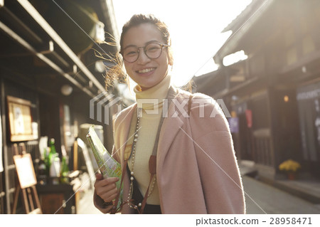 A woman sightseeing old streets 28958471