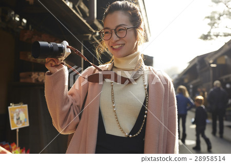A woman sightseeing old streets A woman sightseeing old streets 28958514