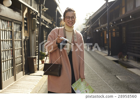 A woman sightseeing old streets A woman sightseeing old streets 28958560