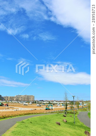 Landscape of an emerging residential area from a beautiful park of blue sky 28958713