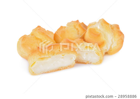eclair or cream puffs with vanilla custard 28958886