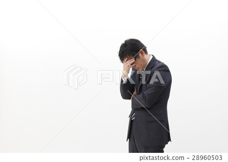 Businessman holding his head Businessman holding his head 28960503