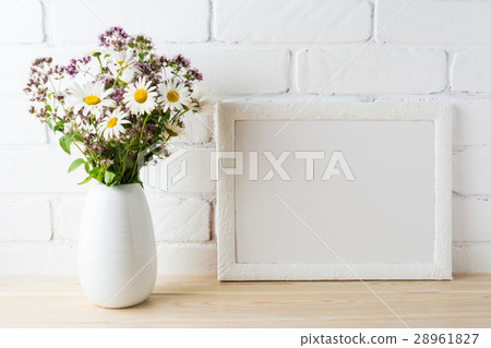 White landscape frame mockup wildflower bouquet White landscape frame mockup wildflower bouquet 28961827