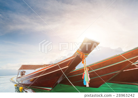 Long tail boat at Ratchaprapha Dam in Thailand. Long tail boat at Ratchaprapha Dam in Thailand. 28963242