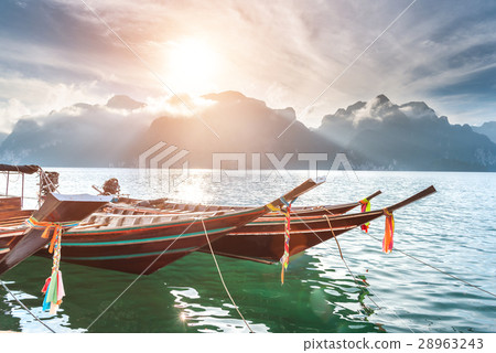 Long tail boat at Ratchaprapha Dam in Thailand. Long tail boat at Ratchaprapha Dam in Thailand. 28963243