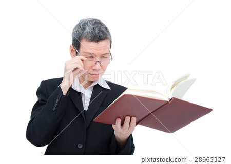 woman reading book having problem with her eyes 28965327