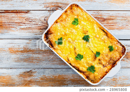 delicious moussaka  in gratin dish 28965808