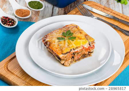 portion of delicious layered moussaka on plate portion of delicious layered moussaka on plate 28965817