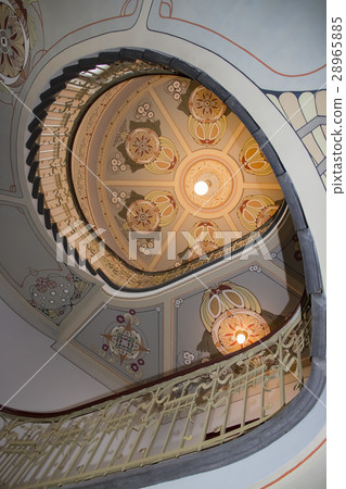 Spiral staircase in an old house 28965885