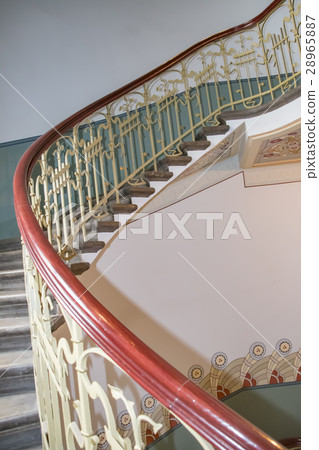 Spiral staircase in an old house 28965887