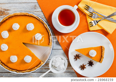 pumpkin pie decorated with anise stars pumpkin pie decorated with anise stars 28968159