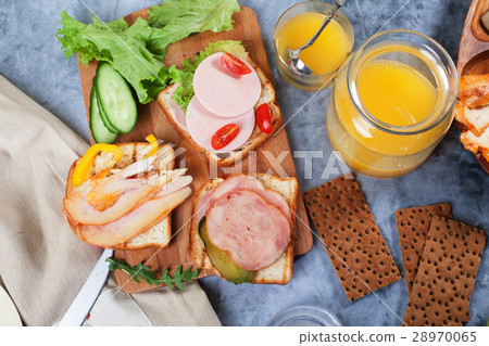 Toast with meat, chicken, sausage from above Toast with meat, chicken, sausage from above 28970065