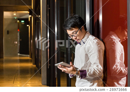 businessman using tablet in modern office businessman using tablet in modern office 28971666