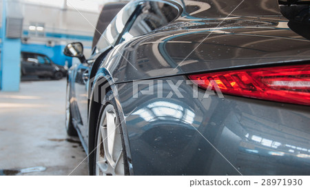 Automobile garage - luxury sport car standing for 28971930