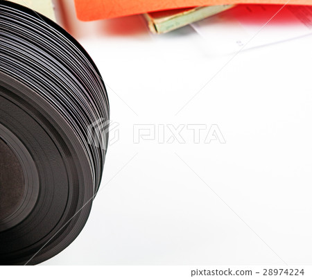 Detail of a table with vintage vinyls. 28974224