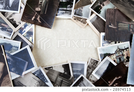 Stack of old photos. 28974513