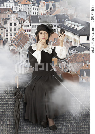 Young woman sitting on the roof Young woman sitting on the roof 28975653