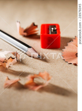 Close up sharpen black pencil on brown paper Close up sharpen black pencil on brown paper 28976045
