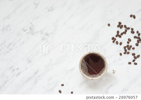 Cup of coffee on a marble surface with copy-space Cup of coffee on a marble surface with copy-space 28976057