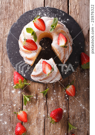 Pound Cake cake with mint and strawberry close-up 28976322