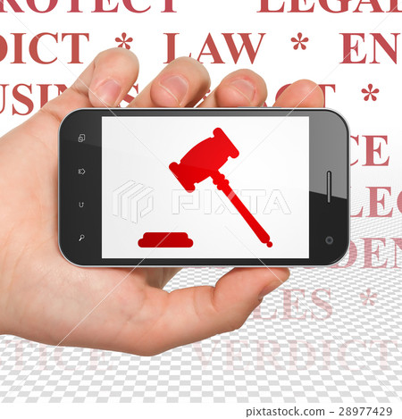 Law concept: Hand Holding Smartphone with Gavel on Law concept: Hand Holding Smartphone with Gavel on 28977429