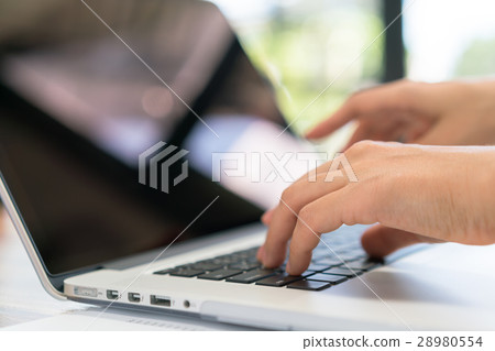Closeup of business woman hand typing on laptop keyboard . 28980554