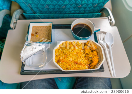 Healthy food on the plane with coffee . Healthy food on the plane with coffee . 28980616