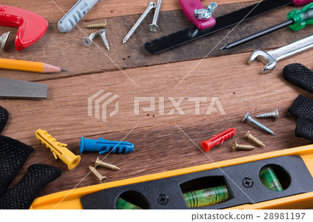 DIY working tools. Working tools on wooden table. DIY working tools. Working tools on wooden table. 28981197