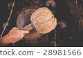 Hand of Asian young man hit big gong. 28981566