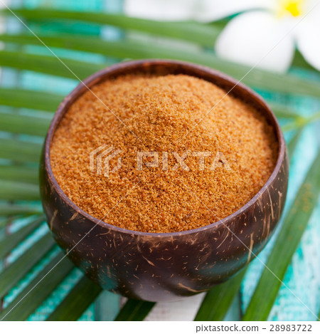 Coconut brown sugar in a wooden bowl. 28983722