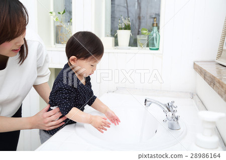 Parent and child washing hands Parent and child washing hands 28986164