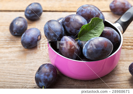 fresh plums on the table fresh plums on the table 28988671