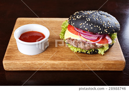 black burger on the board black burger on the board 28988746