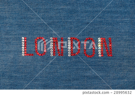 Inscription London, inlaid rhinestones on denim. Inscription London, inlaid rhinestones on denim. 28995632
