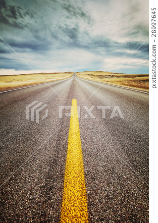 Highway lane close up retro toned picture. 28997645