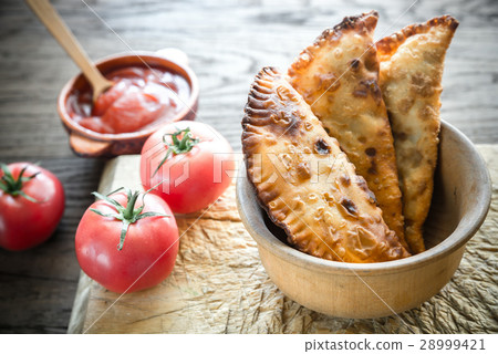 Meat Patties on the wooden background Meat Patties on the wooden background 28999421