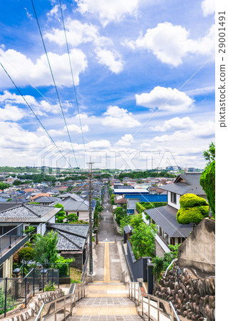 Blue sky with cloud flow and residential area Blue sky with cloud flow and residential area 29001491
