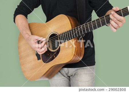 Caucasian Man Playing Guitar Closeup 29002808