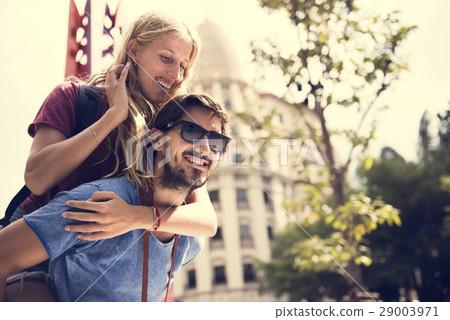 Sweet couple piggyback ride togetherness 29003971