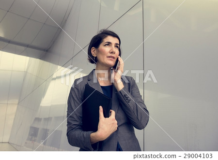 Businesswoman Talking Using Phone Working Busy Businesswoman Talking Using Phone Working Busy 29004103
