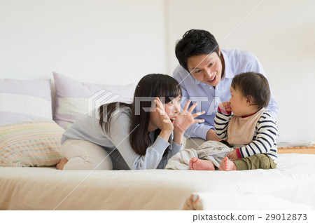 A young couple who babies A young couple who babies 29012873