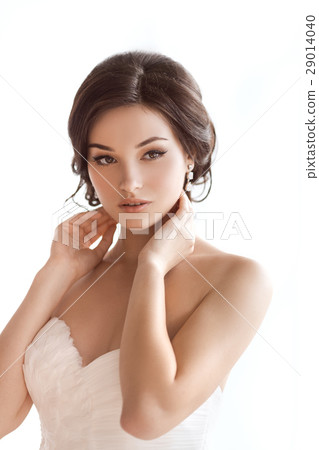 Beautiful brunette asian woman as bride on white 29014040