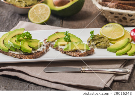 Avocado sandwich on dark rye bread Avocado sandwich on dark rye bread 29016248