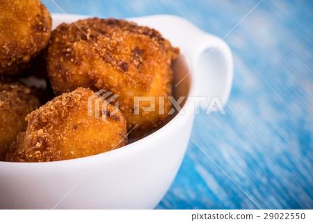 Detail of several pieces of fried cauliflower Detail of several pieces of fried cauliflower 29022550